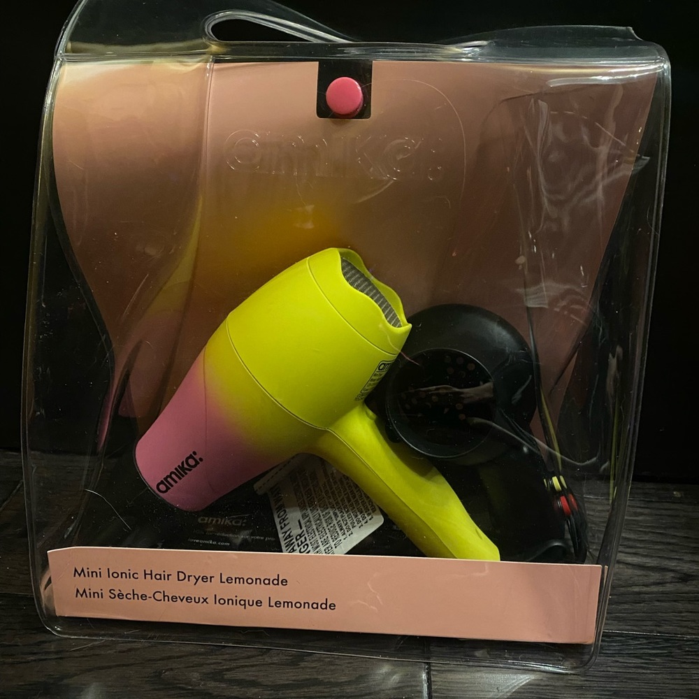 BRAND NEW ionic travel hair dryer by Amika.